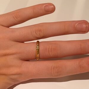 Tiffany and Co Elegant Gold Ring with Diamond Accent